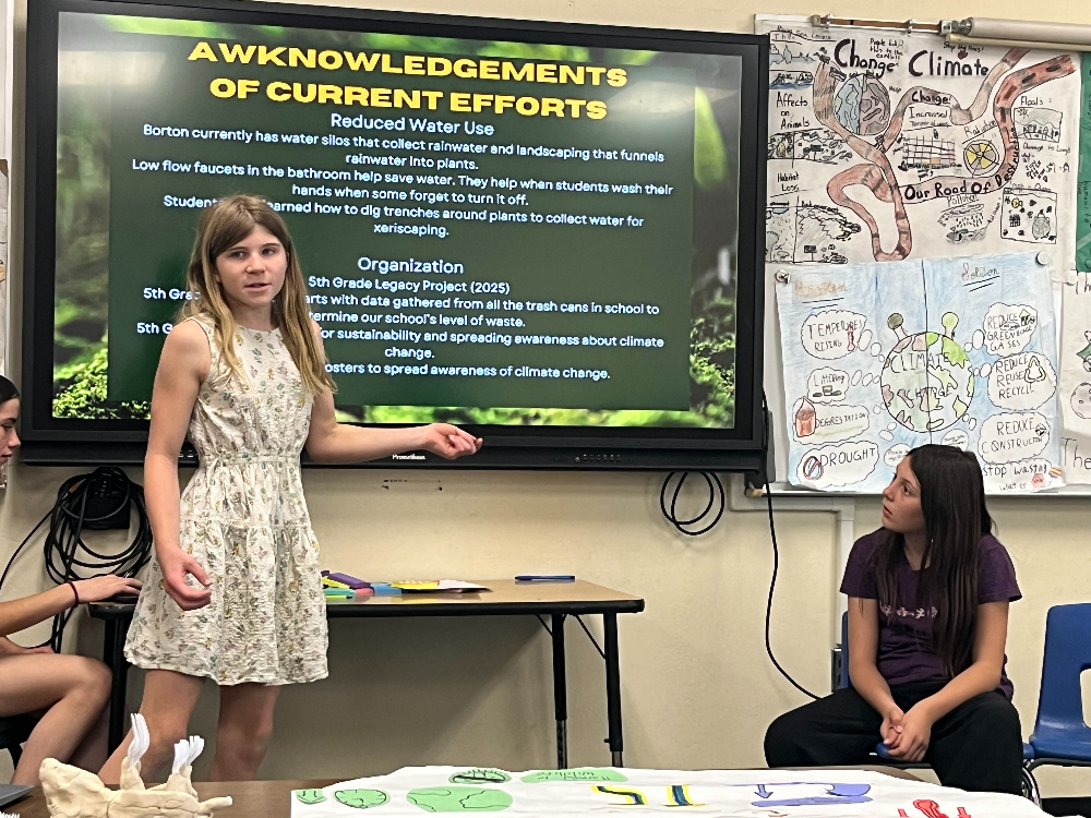 A girl presents a powerpoint