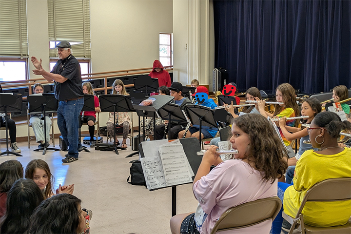 Students perform during the band concert