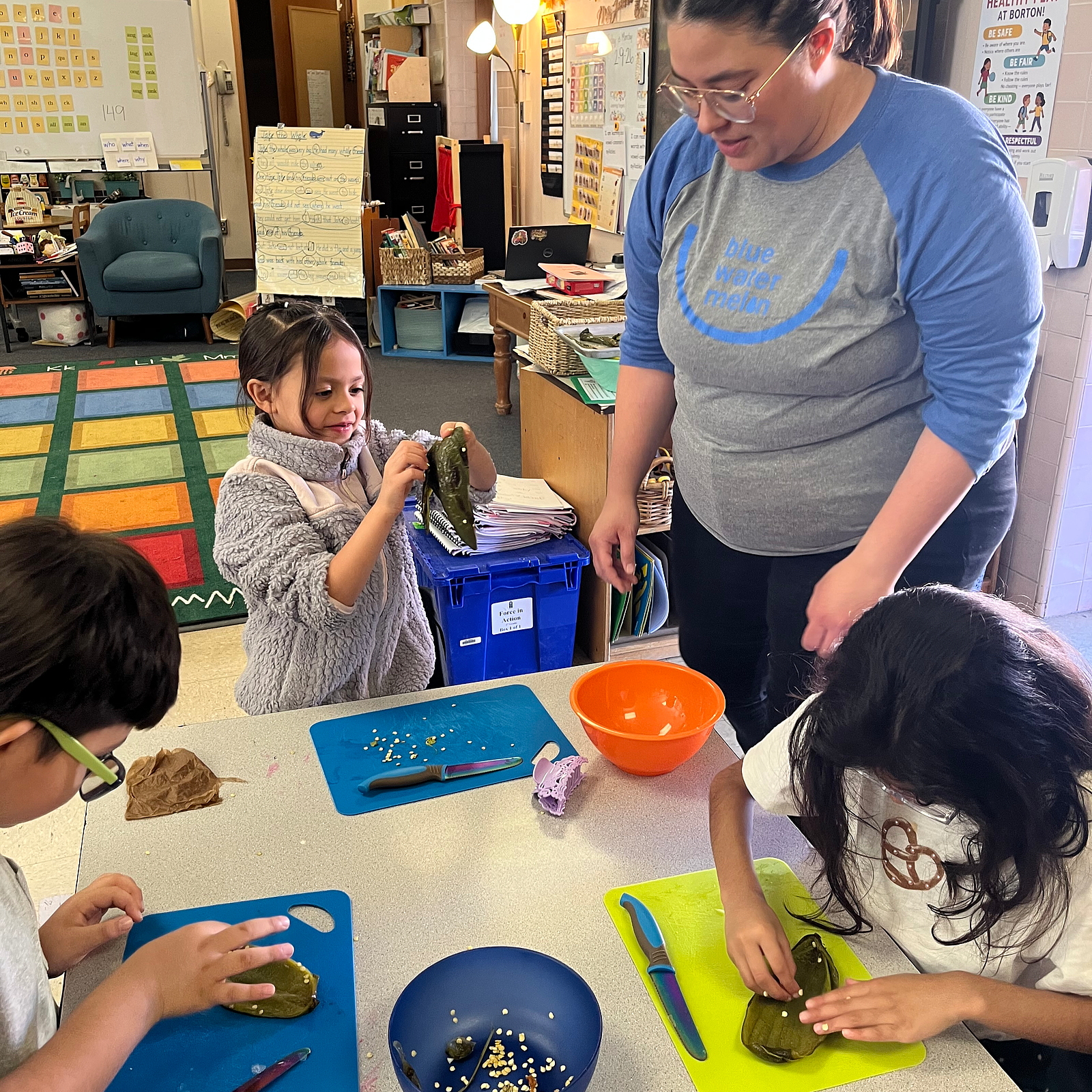 Students slice roasted poblano peppers