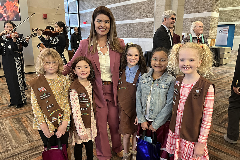 Five girl scouts pose with Tucson's mayor