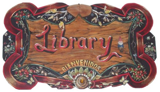 Wooden sign that reads Library