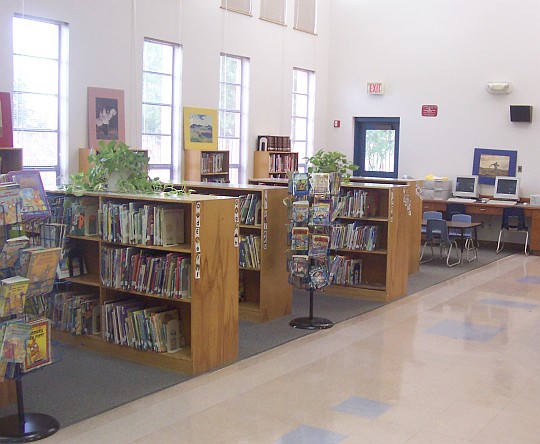 View of the library showing bookshelves and computers